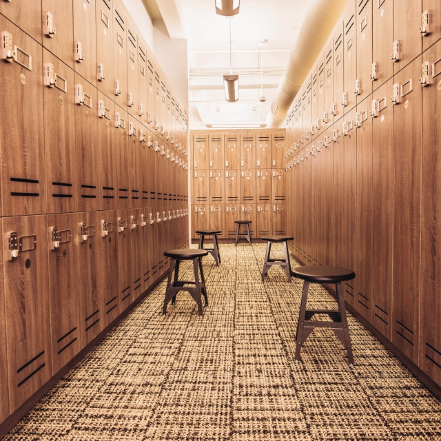 Los Angeles Athletic Club locker room filled with stools.