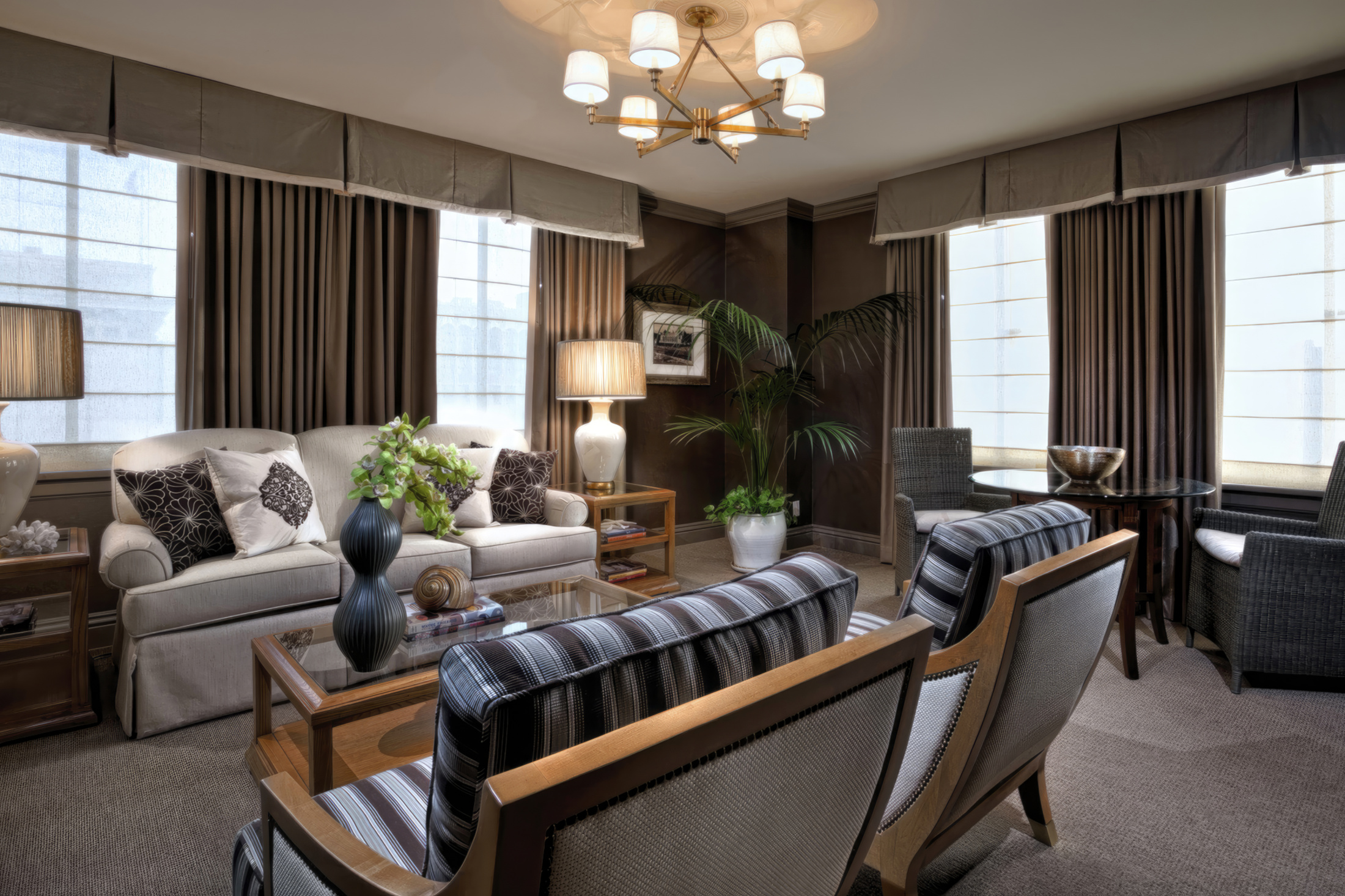 LA Hotel room with couch and comfortable seating and view of LA; Beaux-Arts hotel